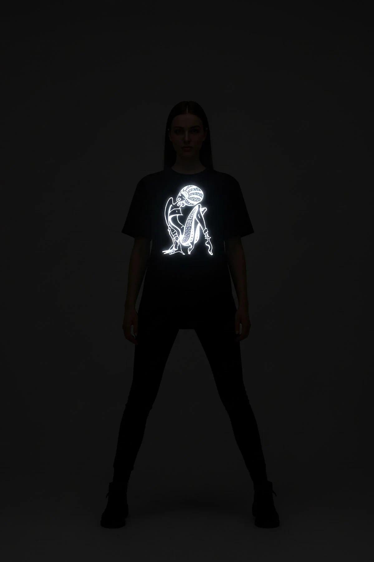 Reflective print black oversized t-shirt full-length on model