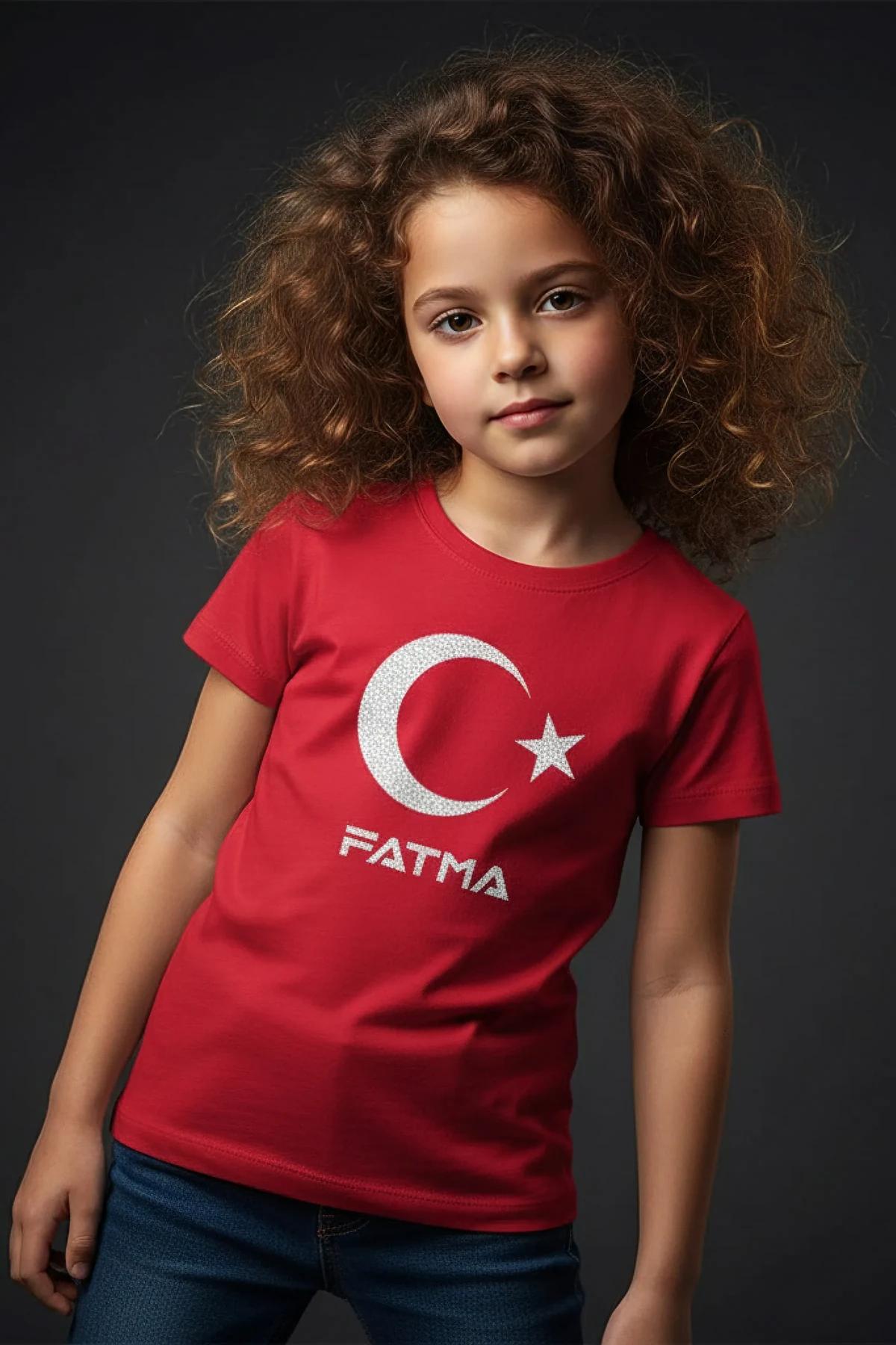 close-up of reflective crescent star heat-transfer print on red cotton kids t-shirt