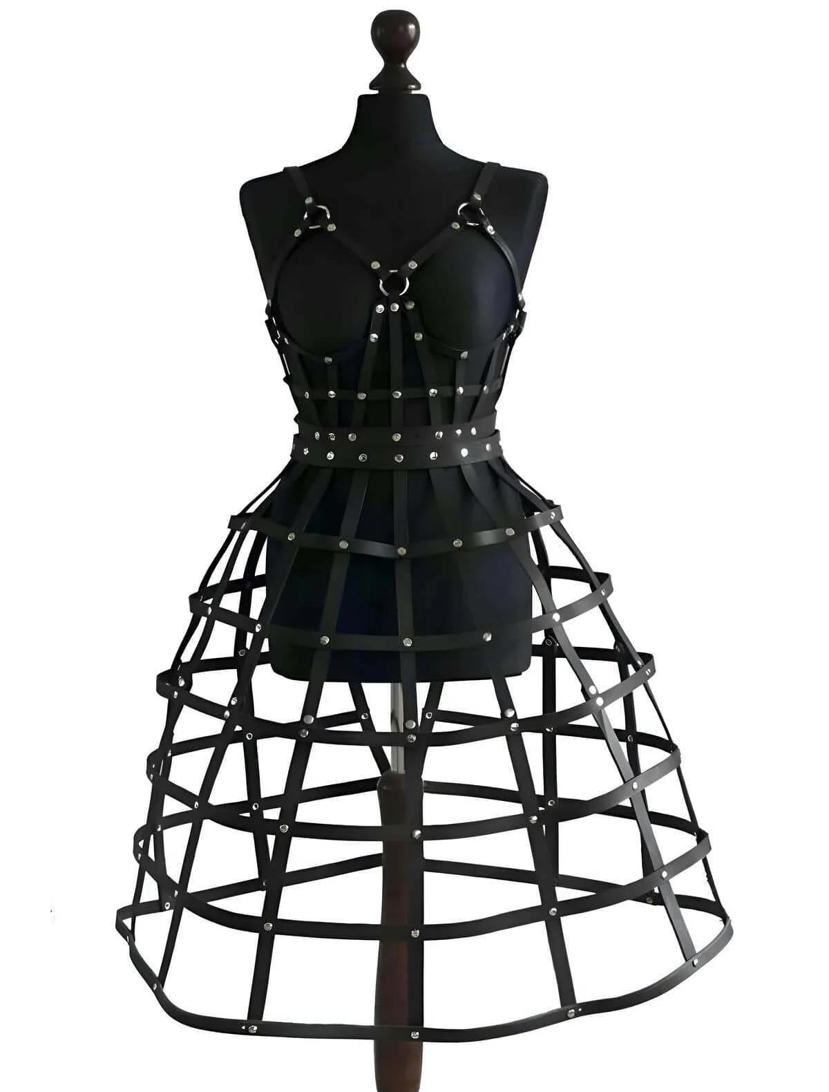 Close-up of silver rivet intersections on black faux leather horizontal cage skirt bands