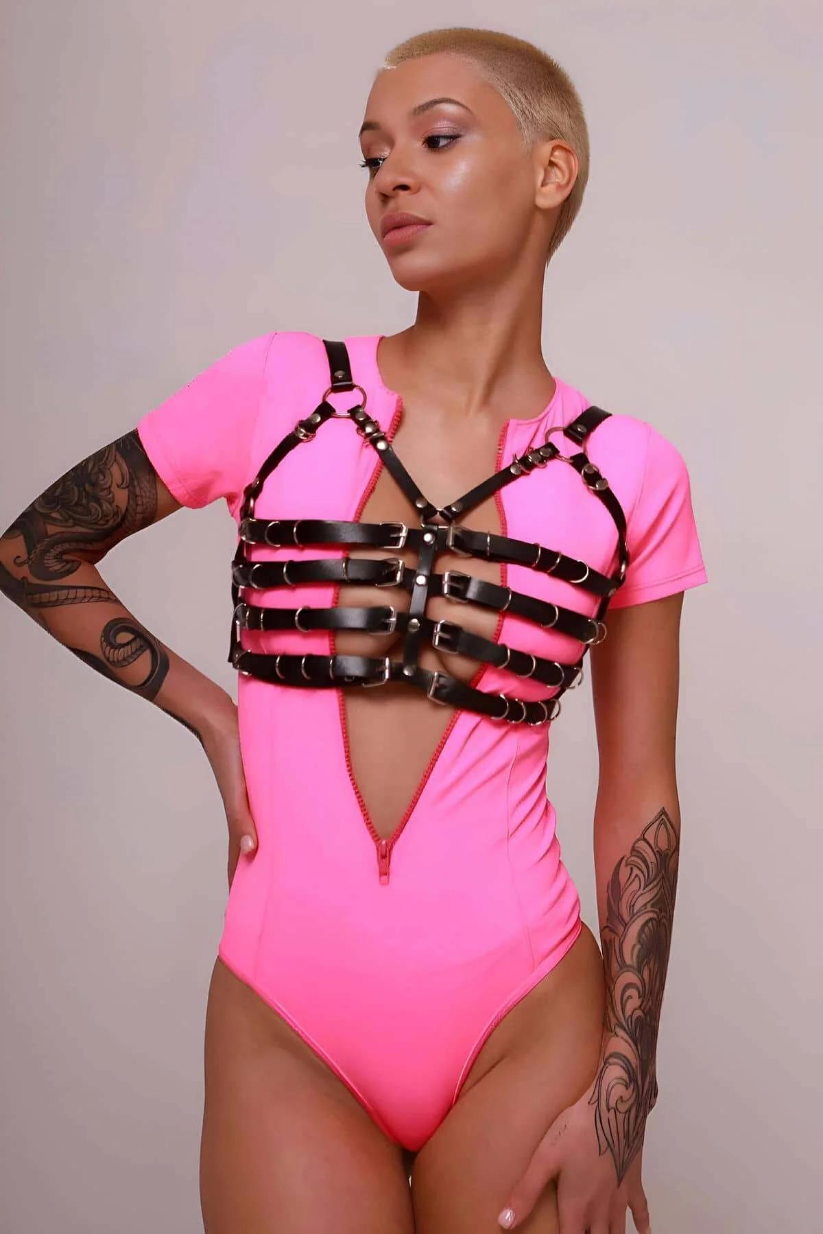 Black multi-strap chest harness with Y-shaped neck piece and cage silhouette, front detail