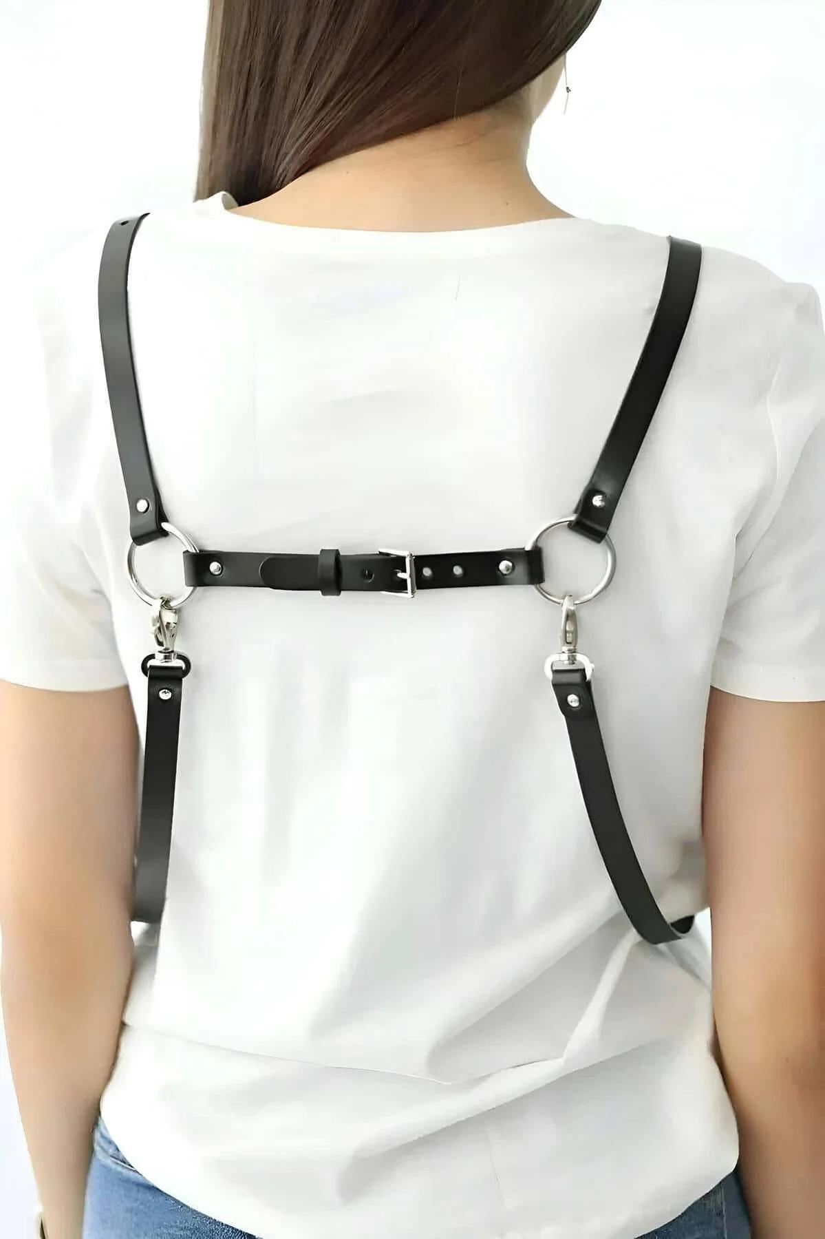 adjustable black faux leather chest harness with silver lobster-claw clips and slide adjusters