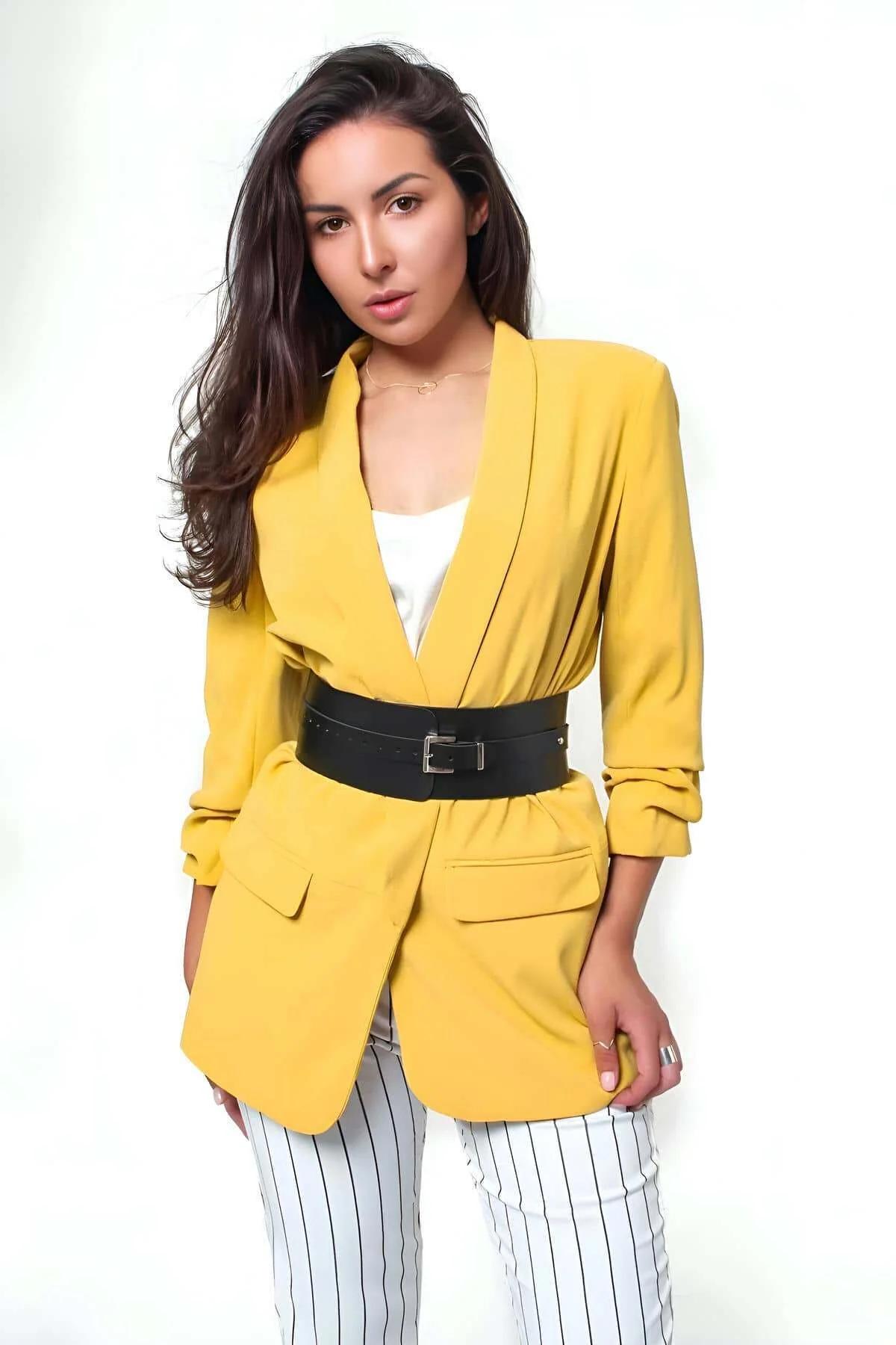 Black vegan leather wide waist belt with punch-hole strap and silver rectangular buckle detail