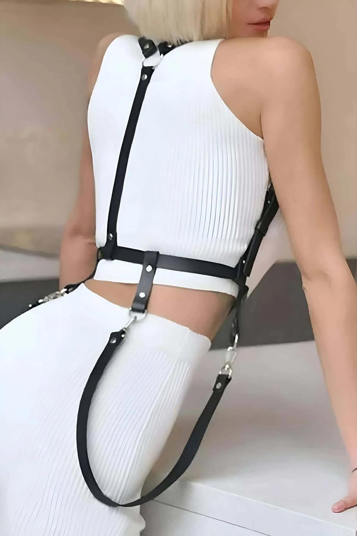Rear view of adjustable black leather harness shoulder straps with silver hardware