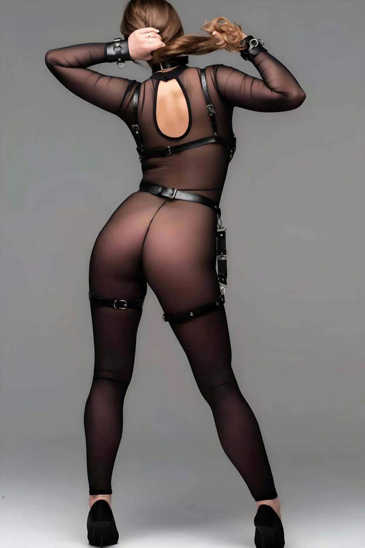 Adjustable black leather thigh cuffs with buckle-and-stud closures attached to vertical outer-thigh straps