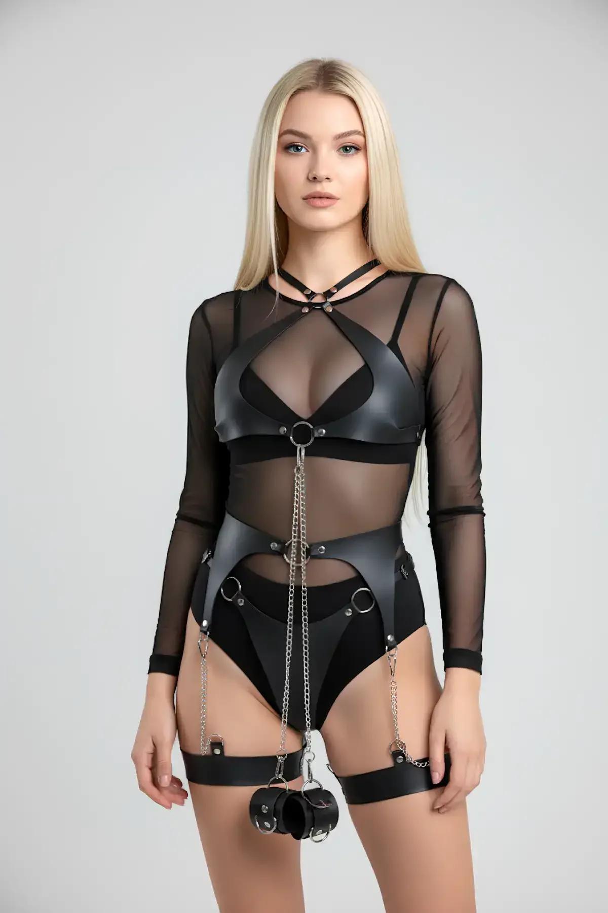 Full body harness set laid flat showing all four pieces: chest harness, hip belt, thigh bands, cuffs