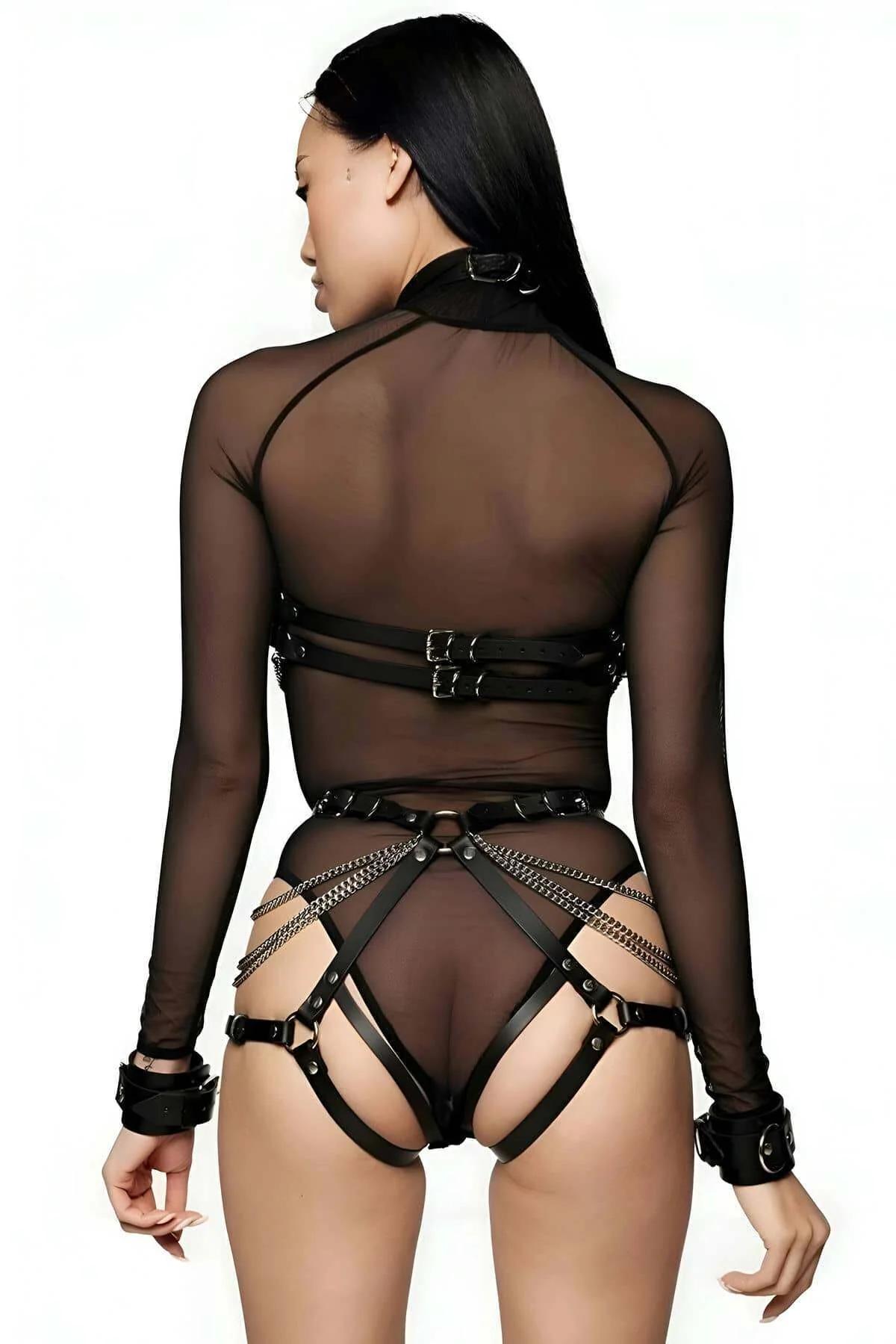 Black PU harness chest band with three draped silver chains and central O-ring detail