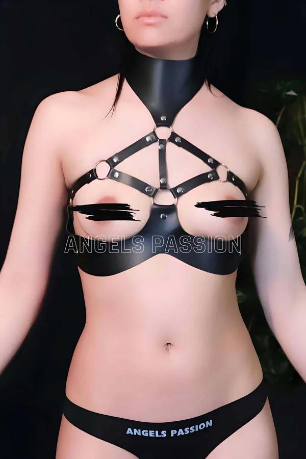 Black faux leather halter neck body harness with silver O-rings and geometric strap design, front view
