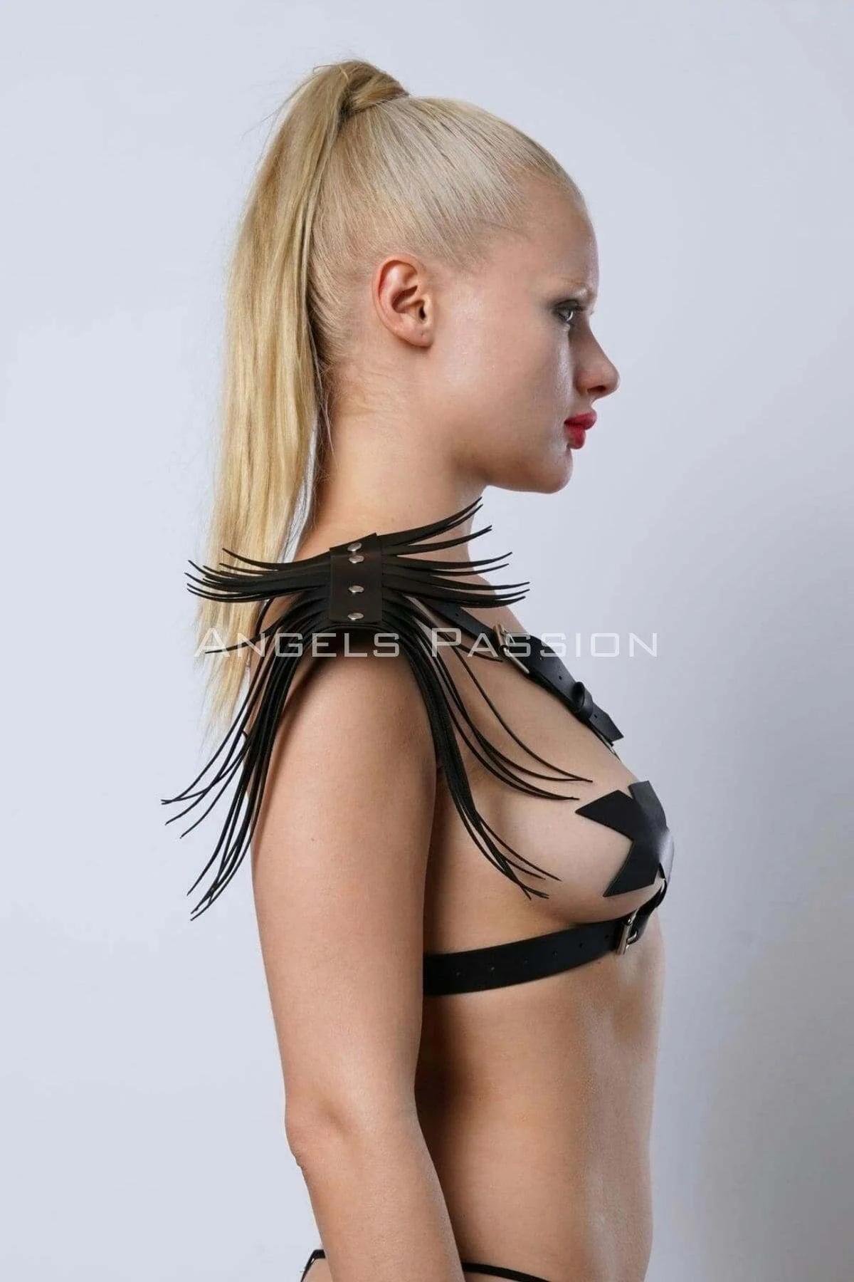Wing-shaped fringe epaulettes on black vegan leather adjustable shoulder harness