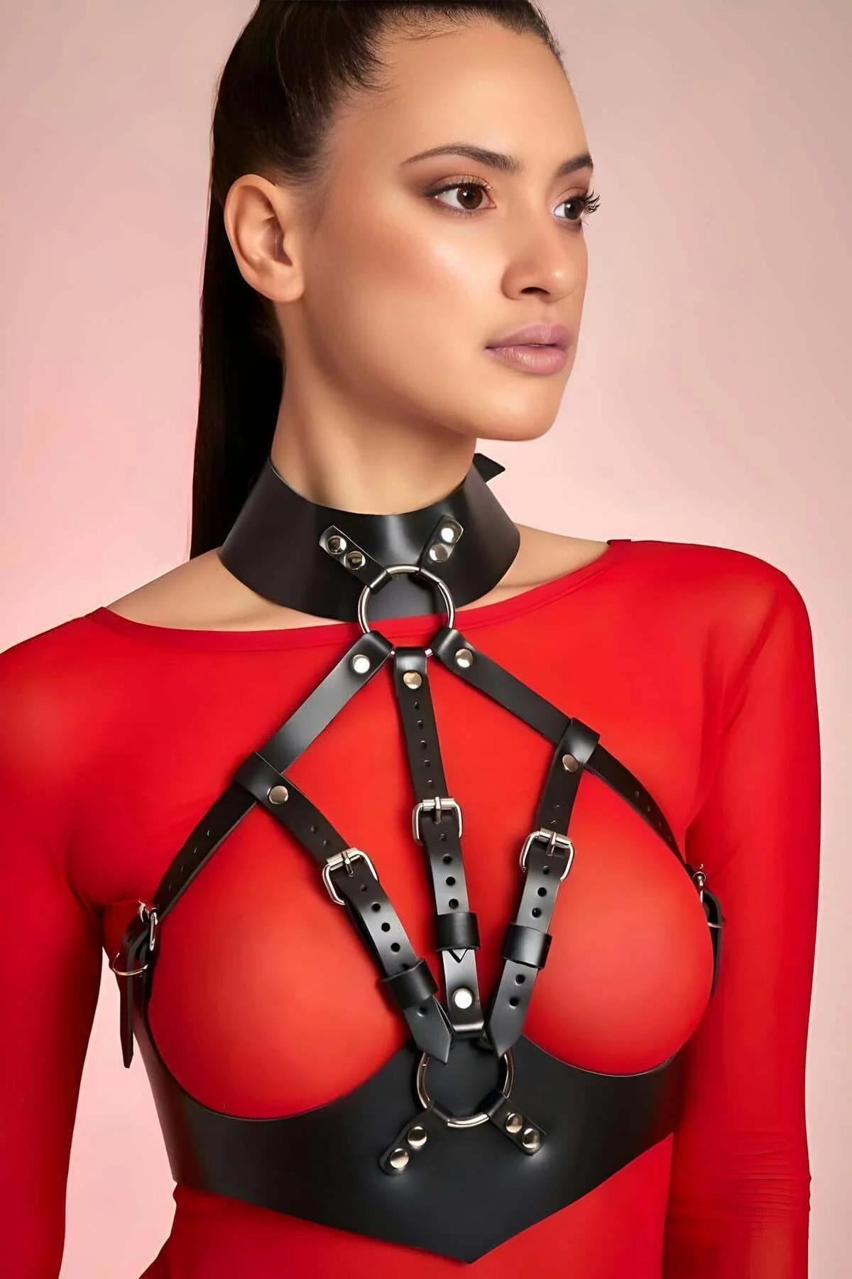 Close-up of adjustable rectangular buckles and narrow 1.2 cm straps on black faux leather halter harness