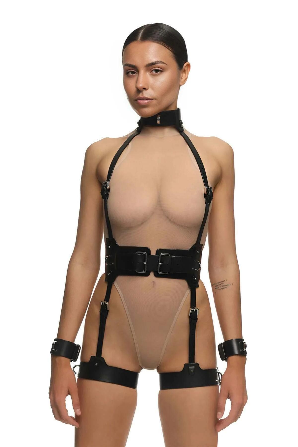 Double-buckle black vegan leather waist belt with vertical straps connecting to thigh garters