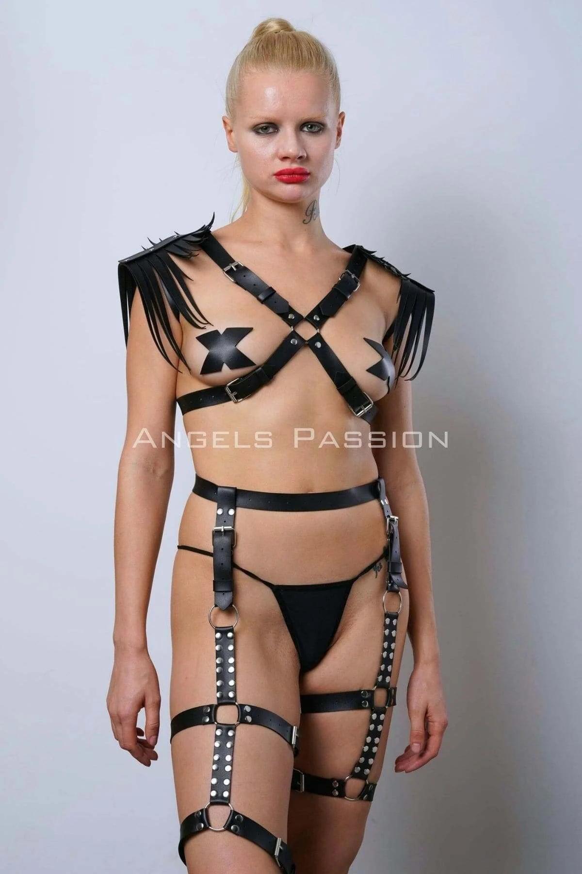 Black vegan leather thigh garter cage with gold O-ring hardware on outer hip