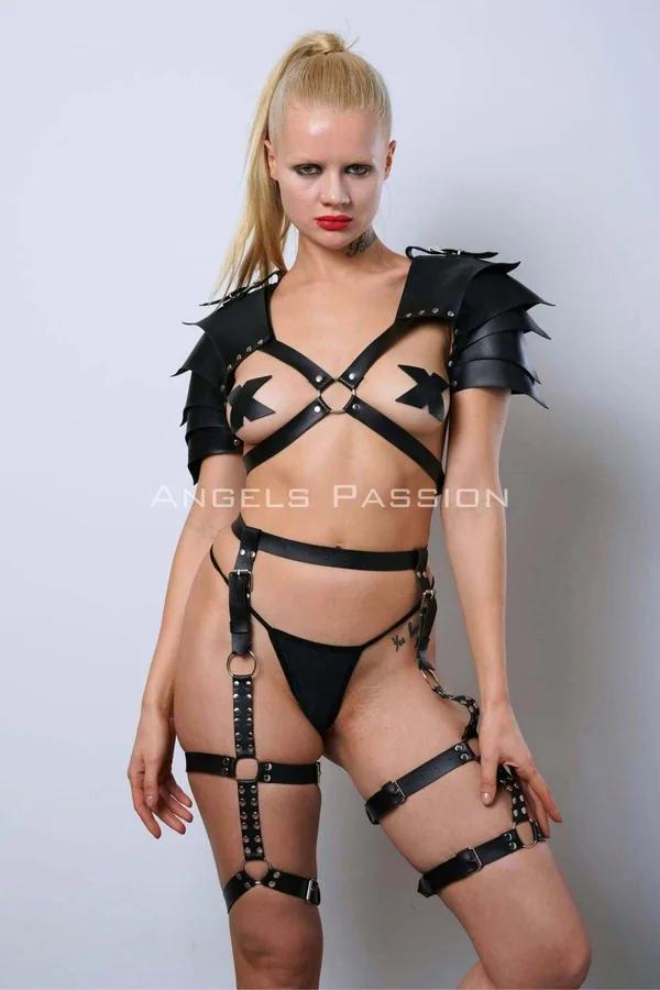 Black faux leather gladiator harness set with jagged armor shoulder pads, chest cross-straps, studded waist band, and thigh l