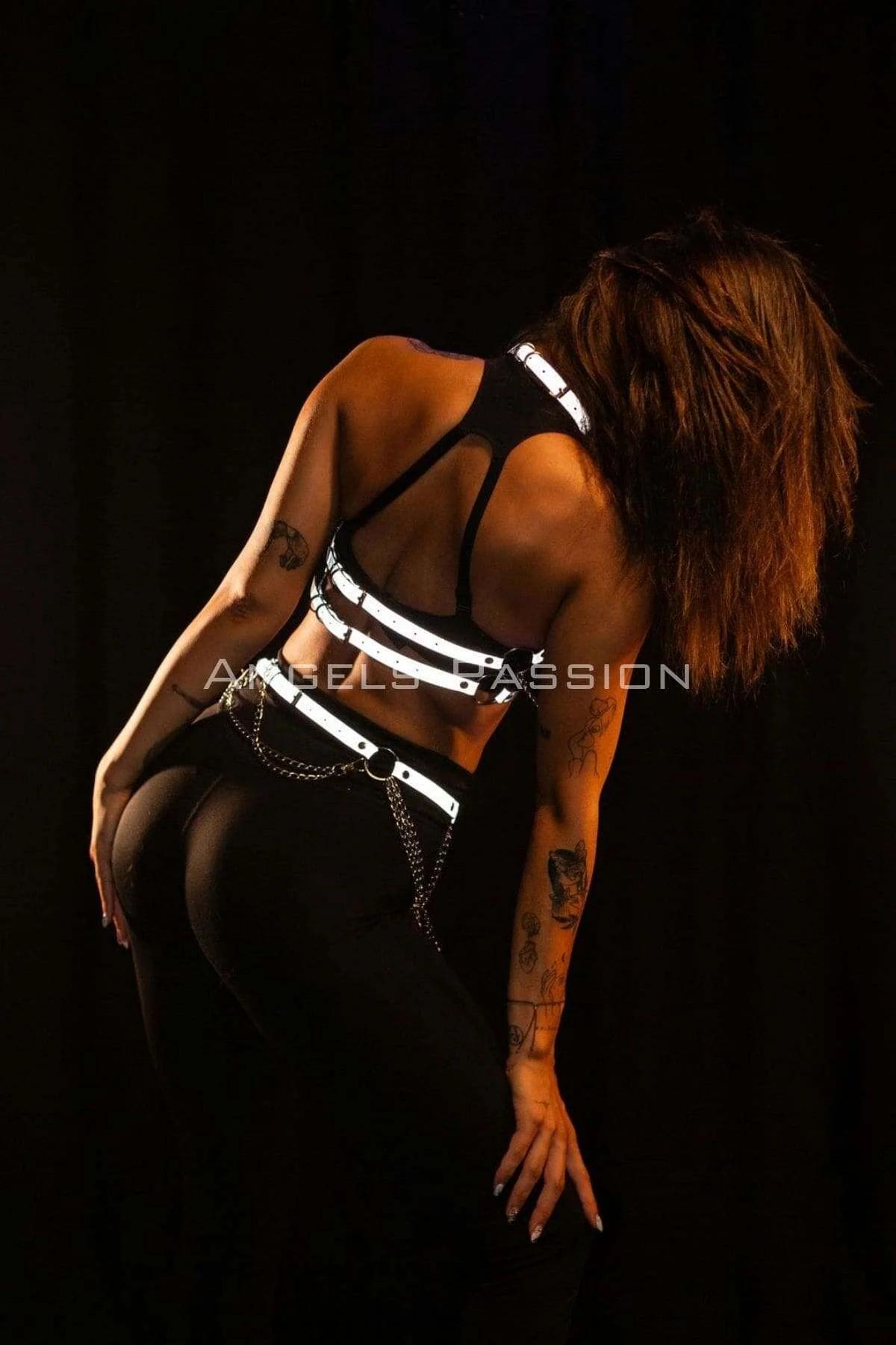 Full two-piece reflective festival harness set with halter top and hip chain belt styled together
