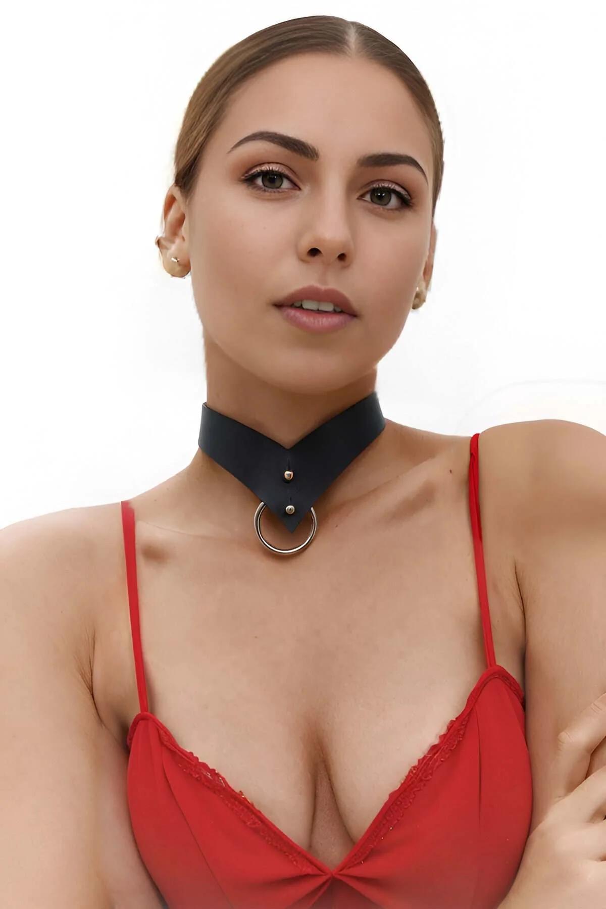 close-up of black PU leather choker band showing silver rivet detail and V-strap angle
