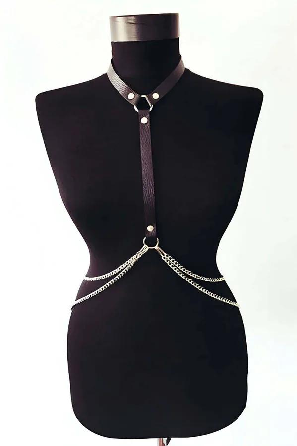 Black faux leather chest harness with silver O-ring dual waist chains and collar strap on mannequin