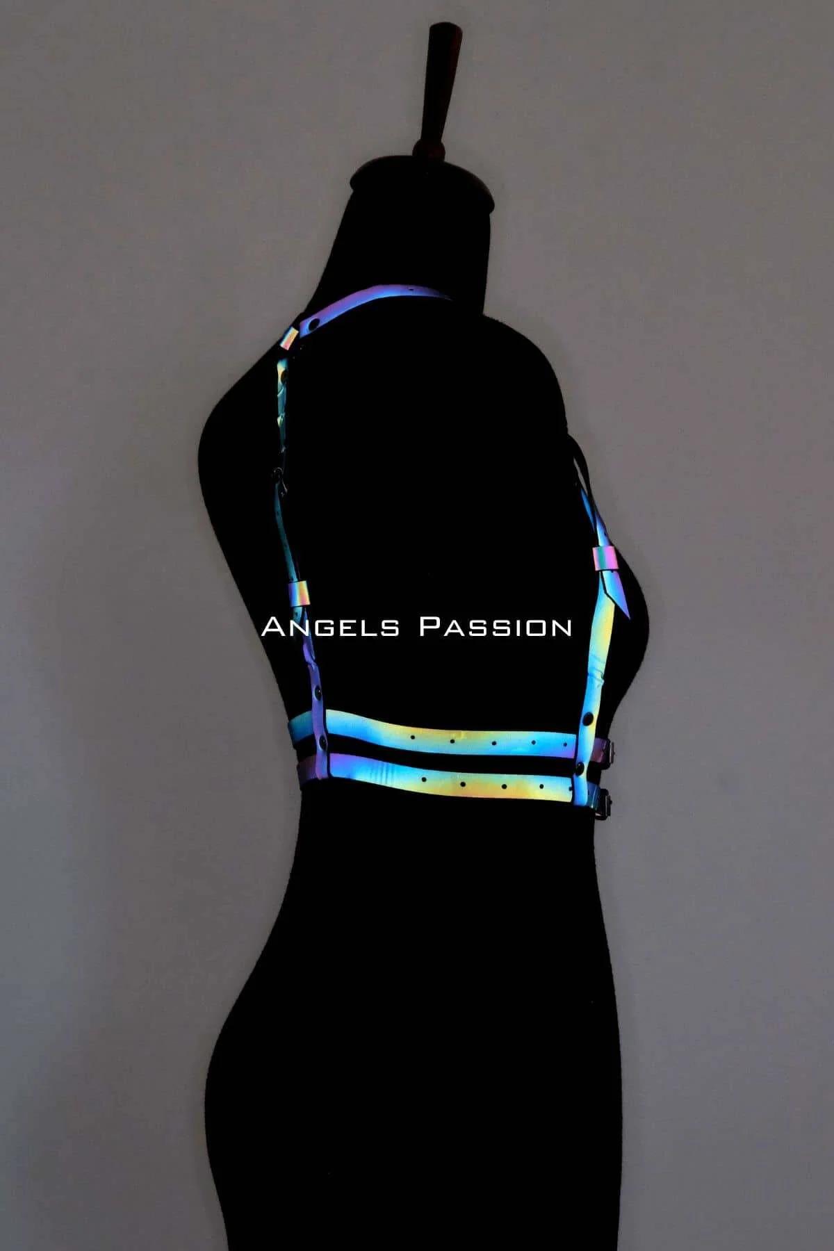Iridescent body harness with matte black metal buckles and adjustable strap detail