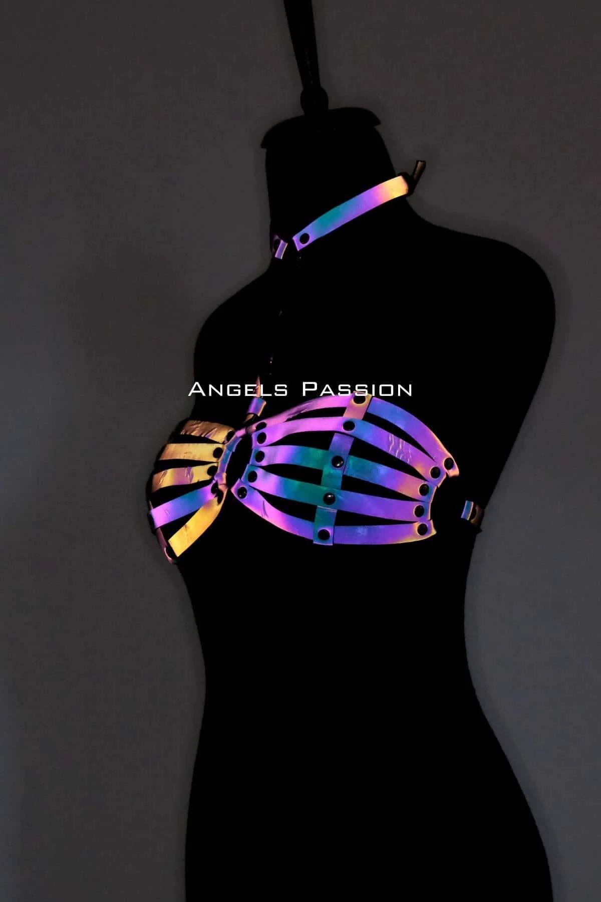 Reflective PVC chest harness with gunmetal rivets and matching choker detail, color-shifting purple and gold tones