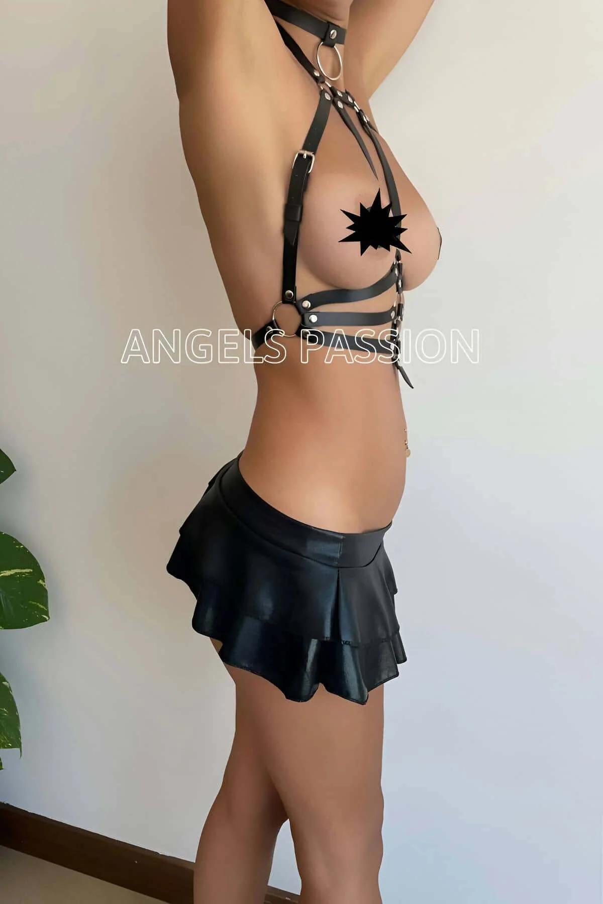 Adjustable black PU leather chest harness showing pin-buckle strap adjusters and silver alloy hardware detail