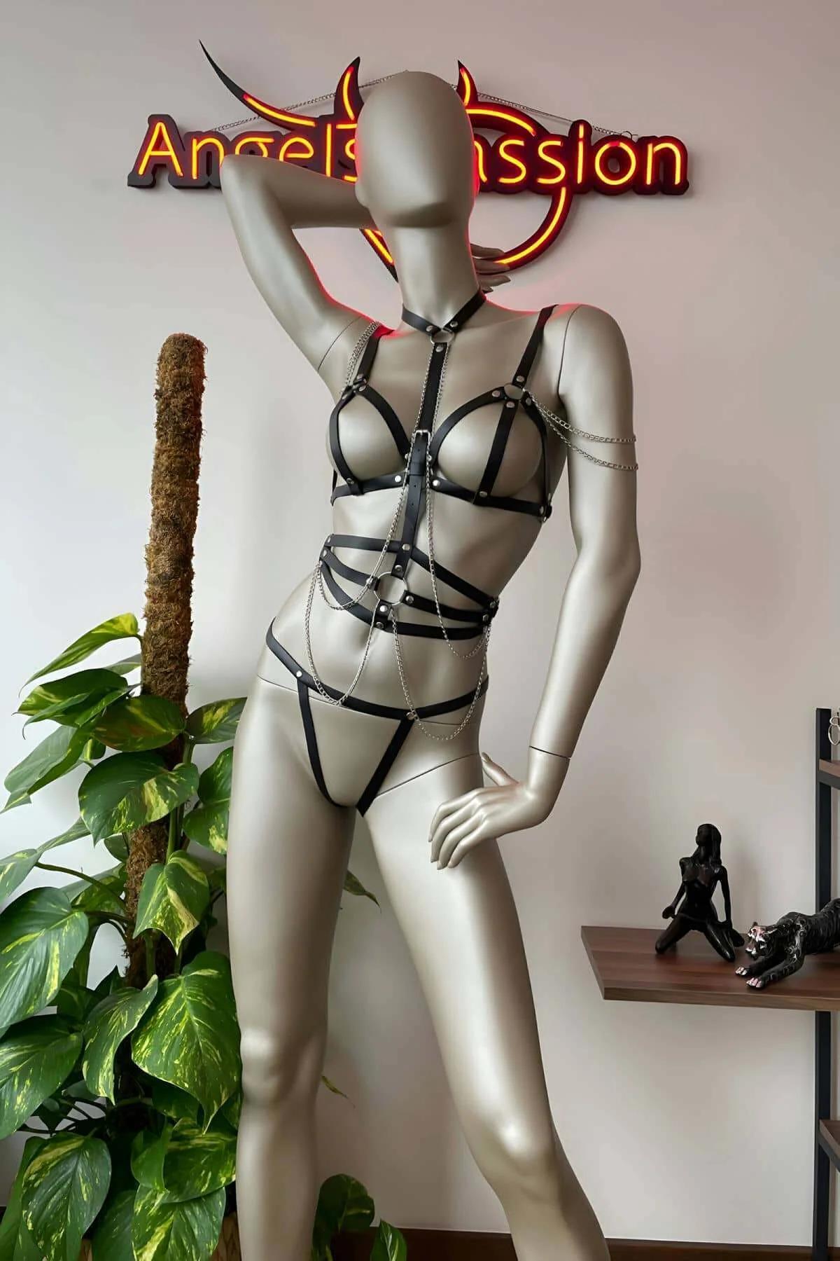 adjustable black faux leather torso bands with metal buckle hardware detail