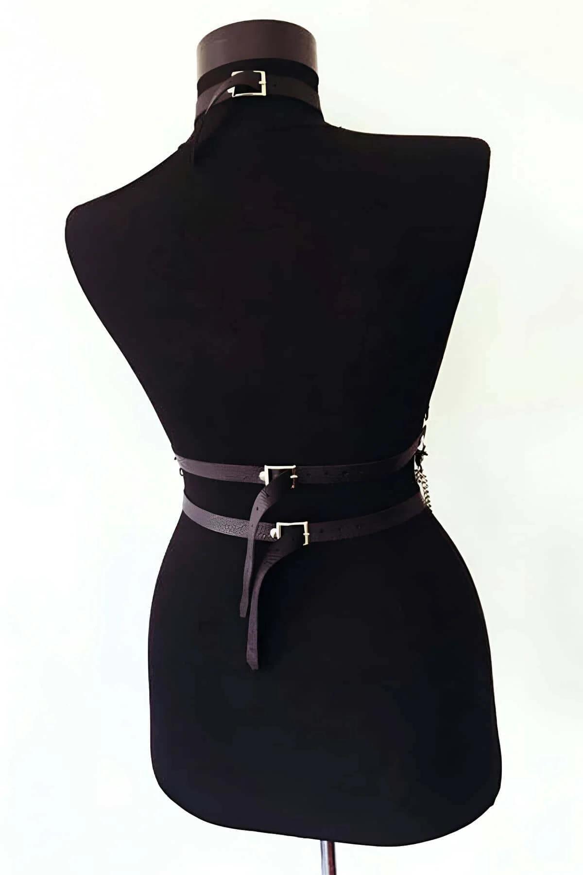black faux leather cross-strap harness neck collar detail with silver rivet hardware