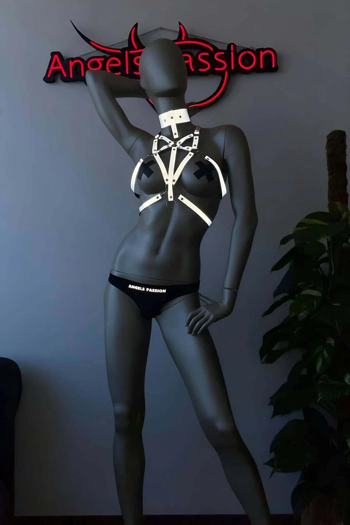 Matching white reflective choker panel close-up with slider buckle and grommets