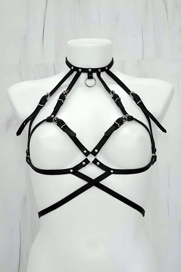 Black faux leather chest harness with O-ring choker, silver buckles, and cross-strap underbust cage on white mannequin
