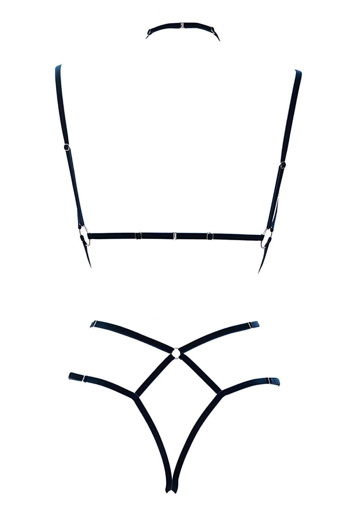 Black nylon-elastane body harness layered over white fabric showing strap configuration