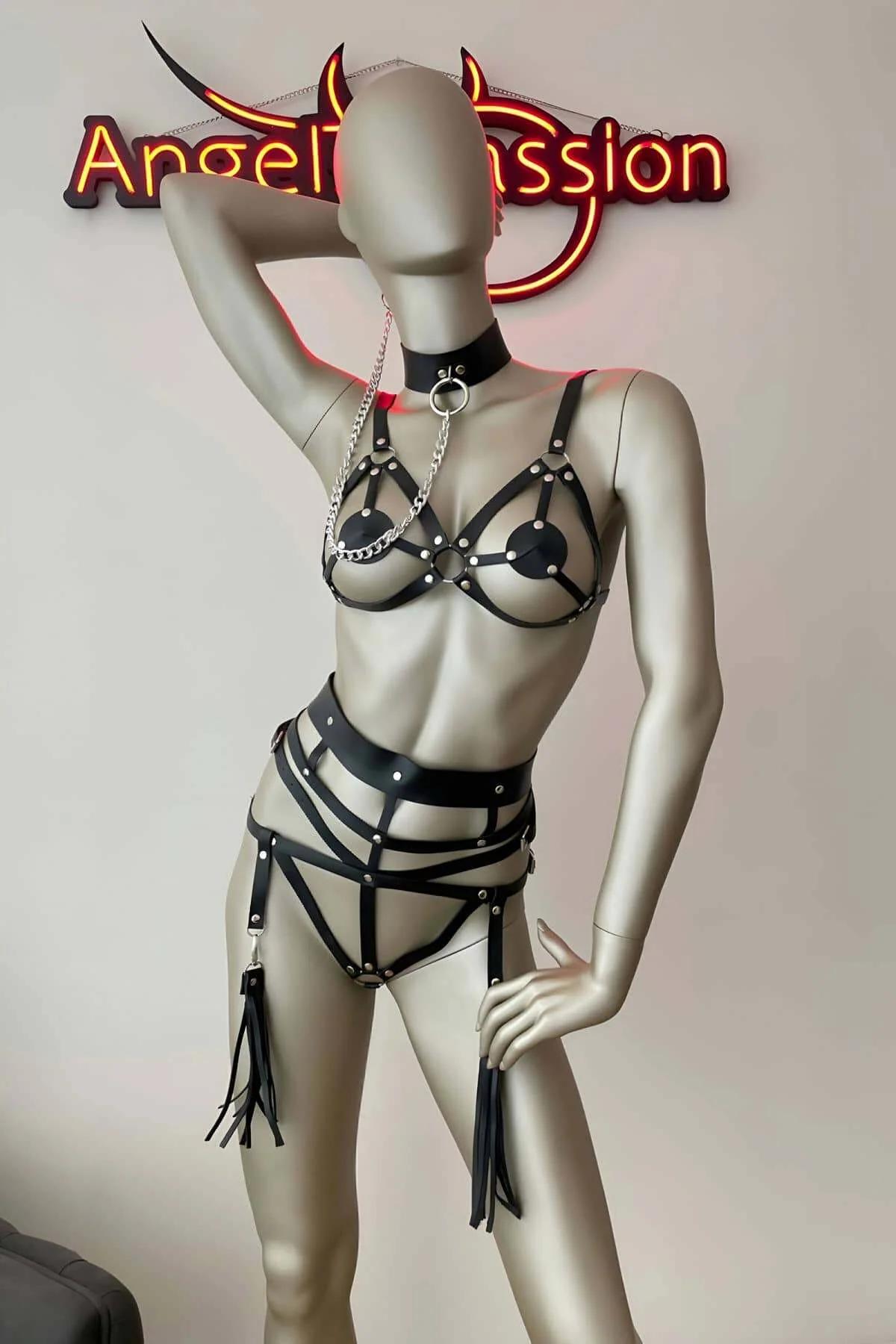 O-ring choker collar with silver link chain connecting to open-cup cage harness front detail