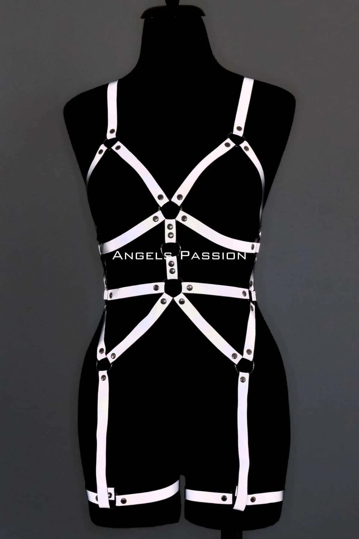 Reflective harness strap layout showing hip frame and waist band structure, studio lighting