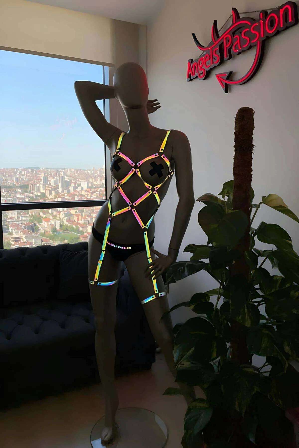 Rear view of rainbow reflective body harness showing adjustable shoulder straps and back strap configuration