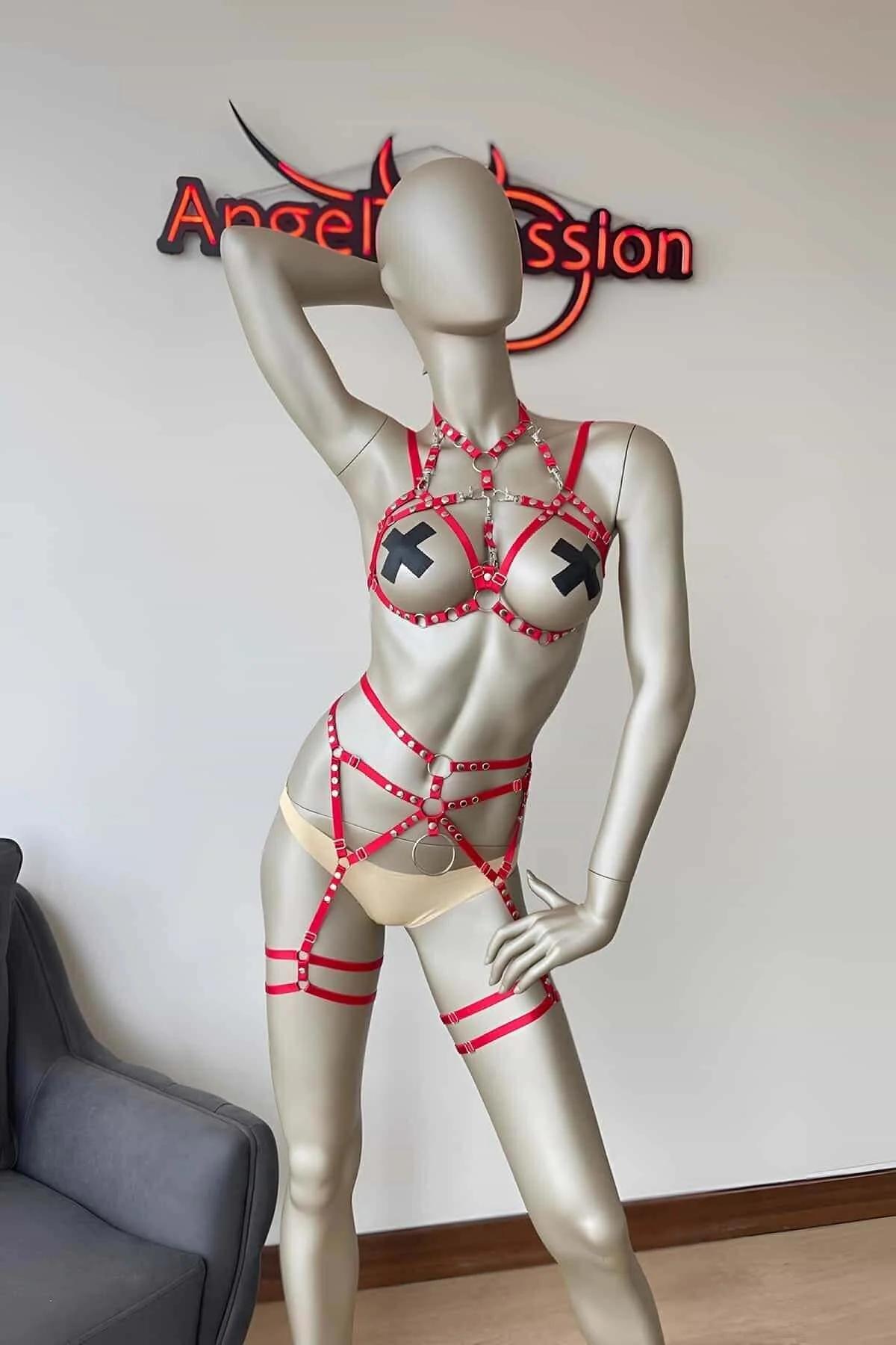 Front view of red faux leather chest harness with silver stud collar and 3 cm central O-ring detail