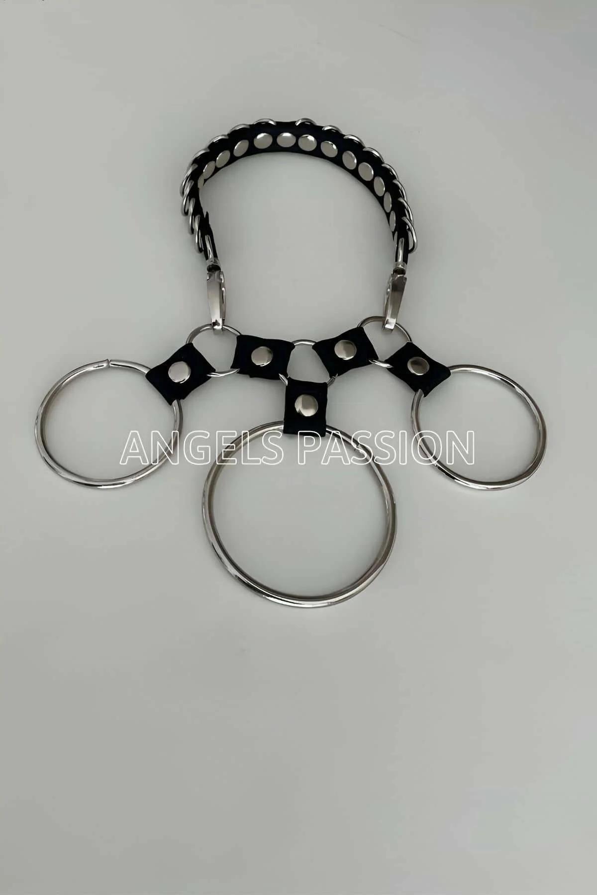 Black leather choker with star cutouts and three circular silver rings laid flat product view
