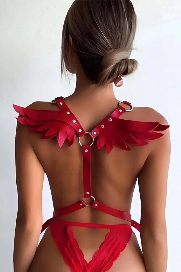 Red faux leather angel wing body harness back view with layered feather shoulders and silver O-rings