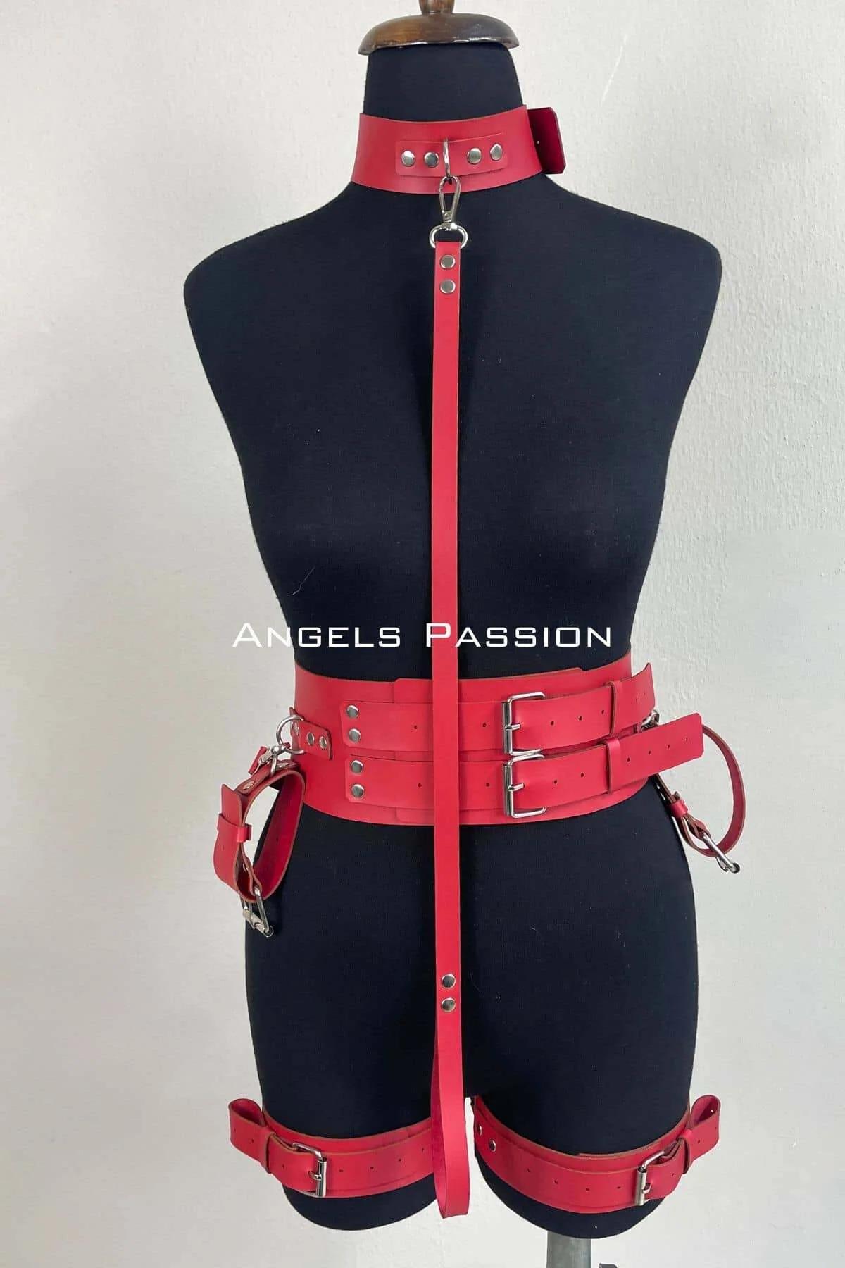 Full back view of red faux leather body harness showing adjustable strap and thigh cuff placement