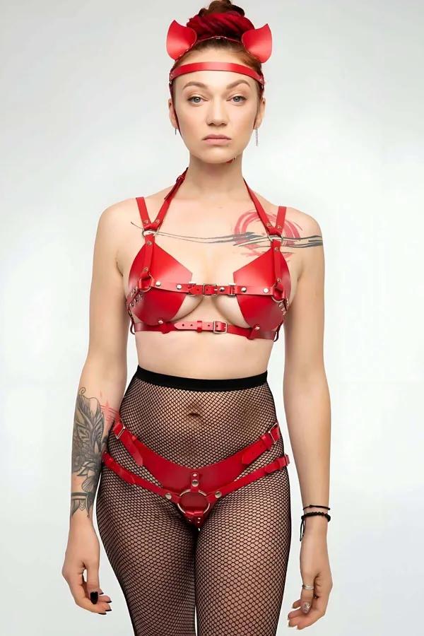 Red faux leather bra and panty harness set with silver O-ring and adjustable buckle straps, front view