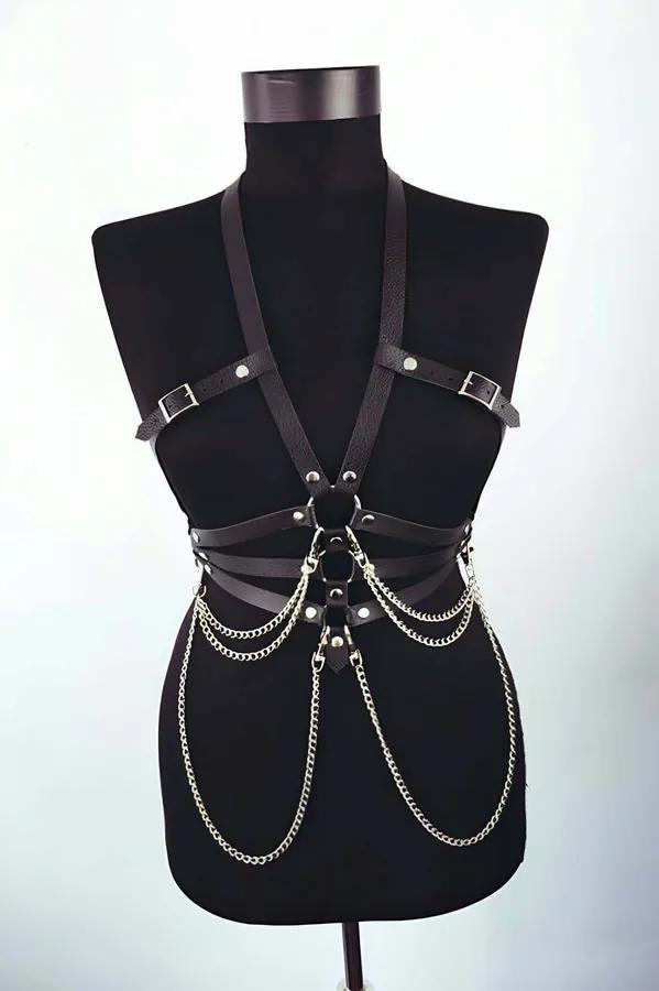 black faux leather body harness with four cascading silver chains draped from waist O-ring and adjustable shoulder buckle str
