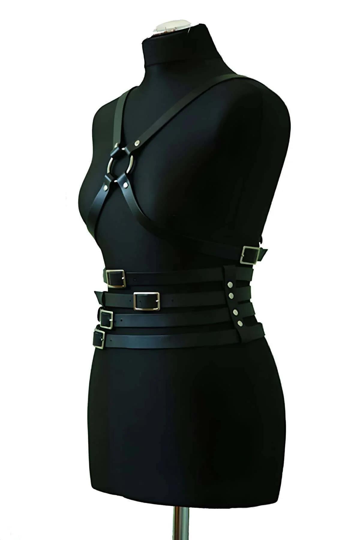 front view of black PU leather harness showing O-ring chest accent and stacked waist bands