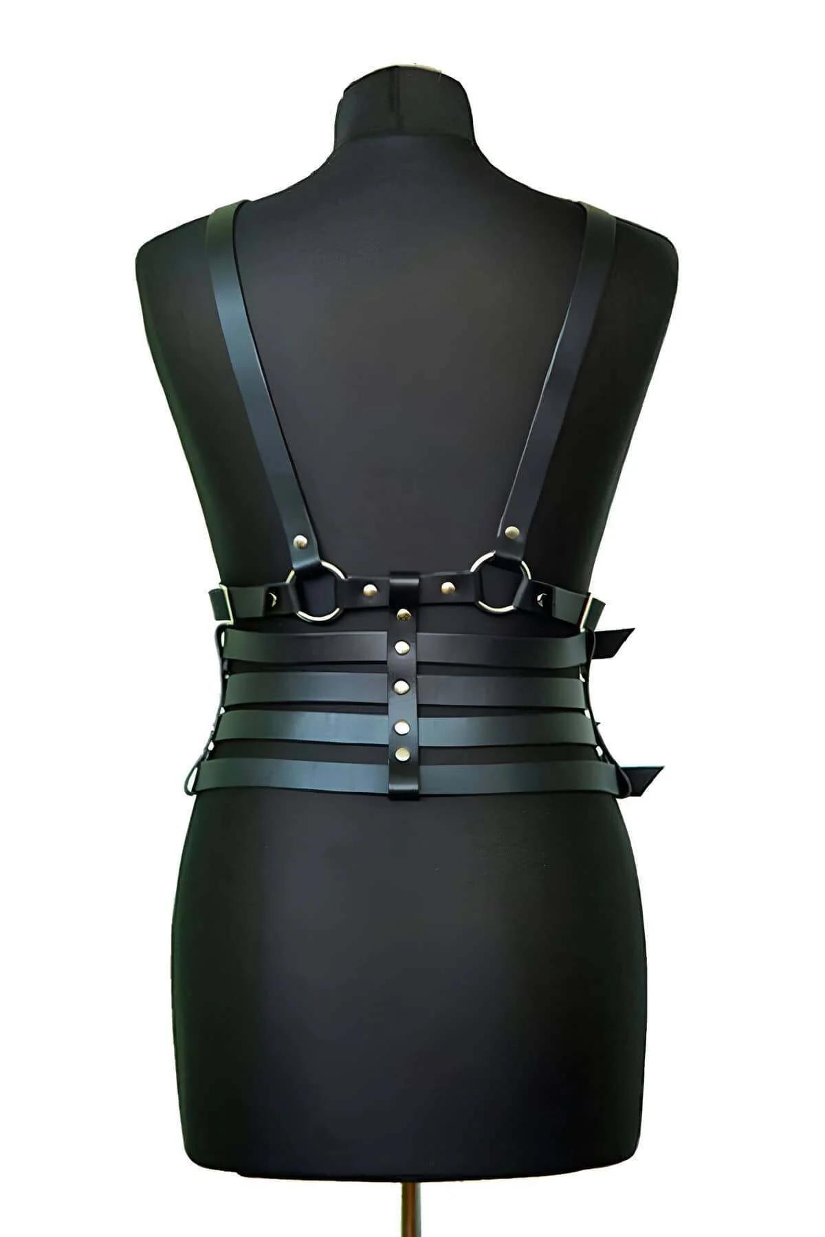 side profile of black body harness with four horizontal waist straps on mannequin