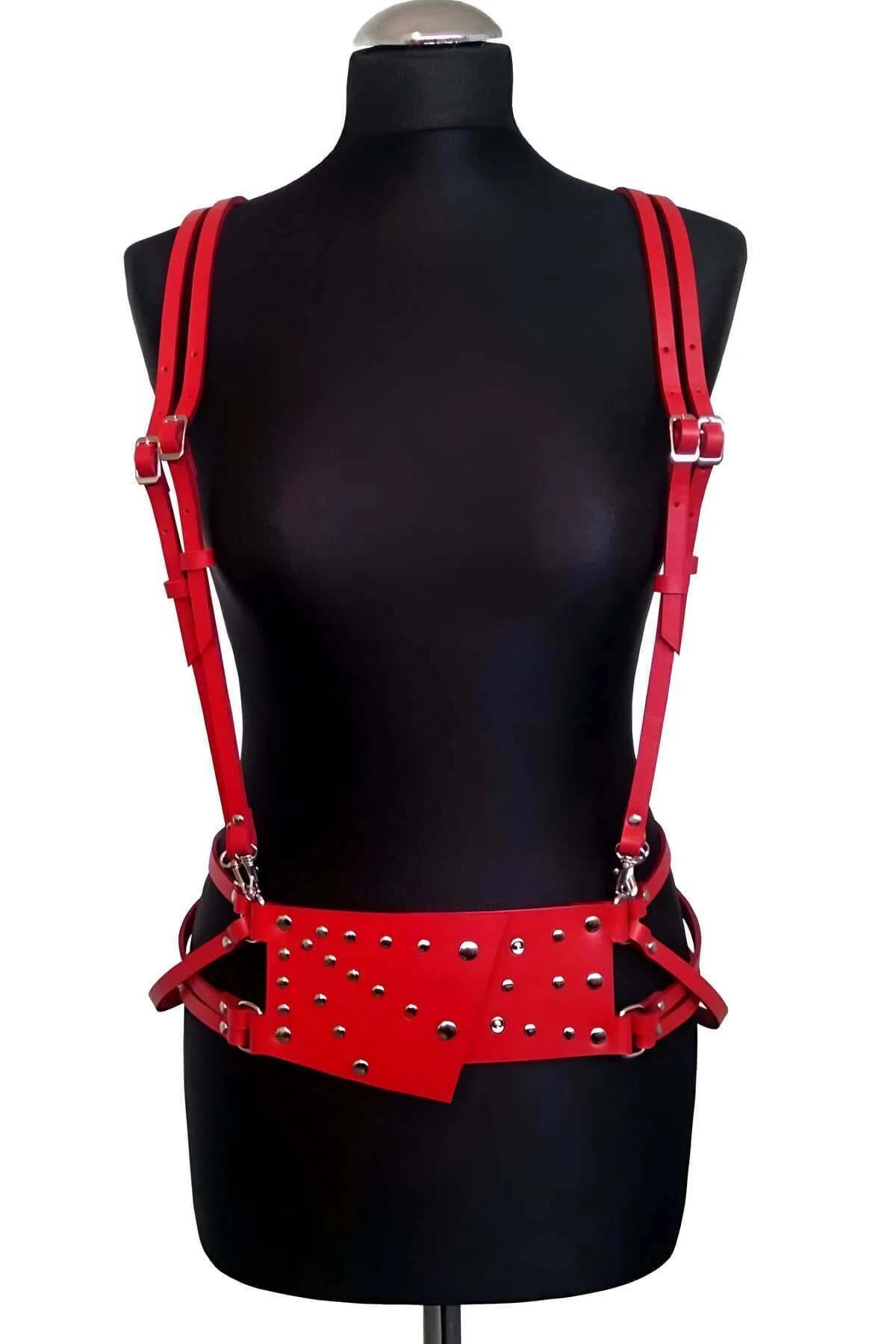 Red faux leather body harness shoulder strap detail with silver-tone buckle adjuster