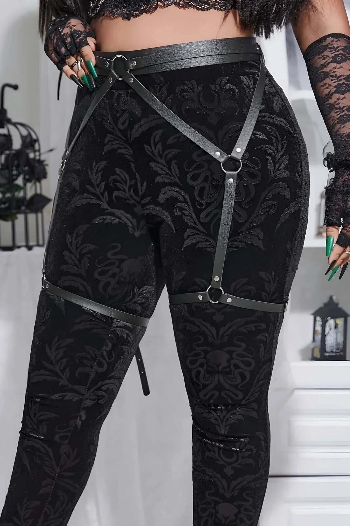 back view of black garter harness wide waist band with rivet stud hardware