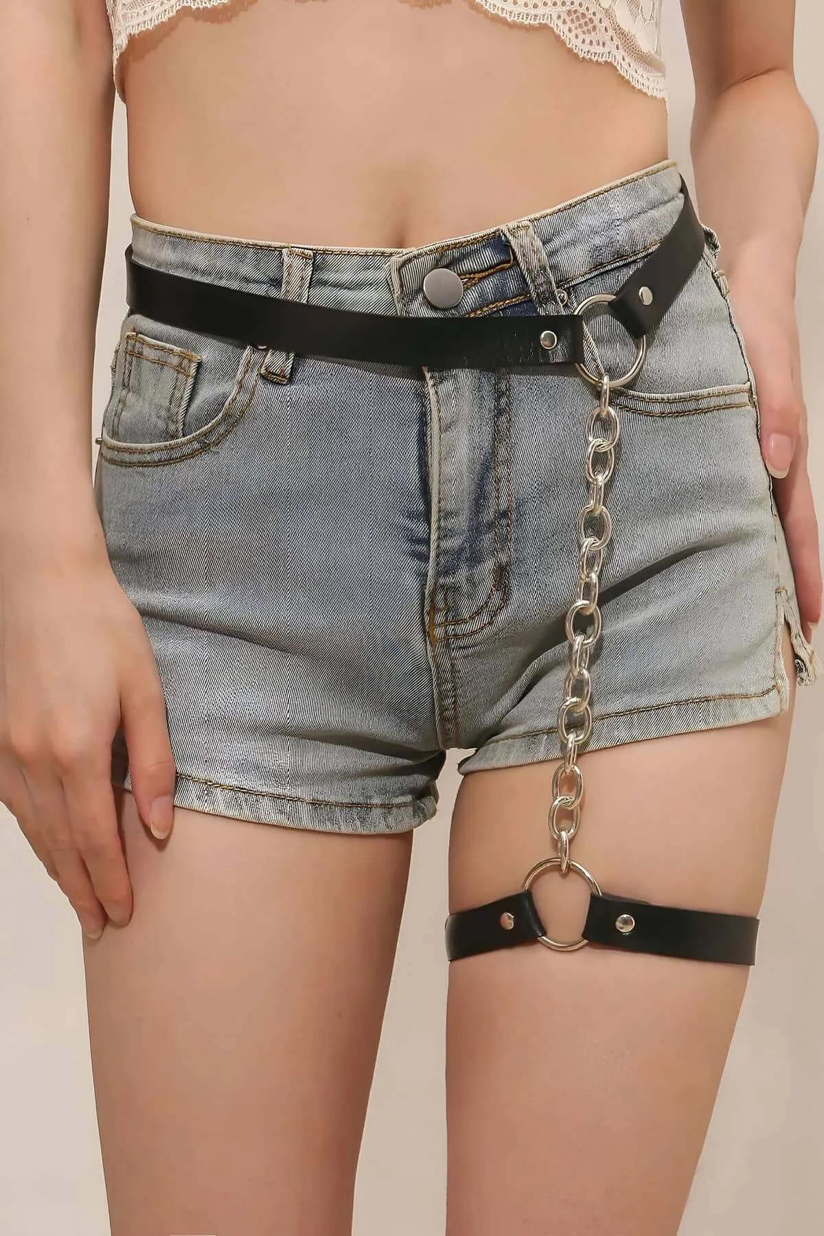 black faux leather waist harness snap-stud closure and silver O-ring detail