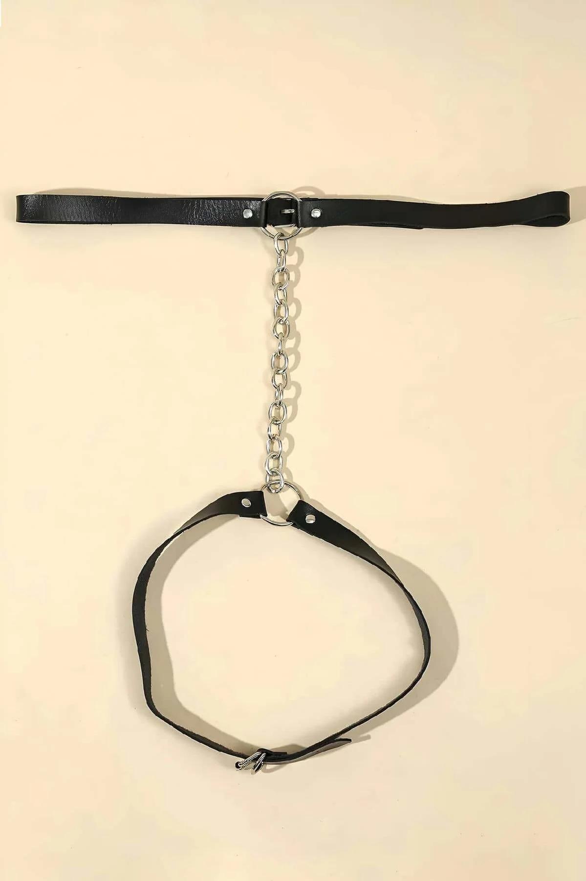 thigh garter band with silver O-ring worn over denim shorts showing adjustable strap