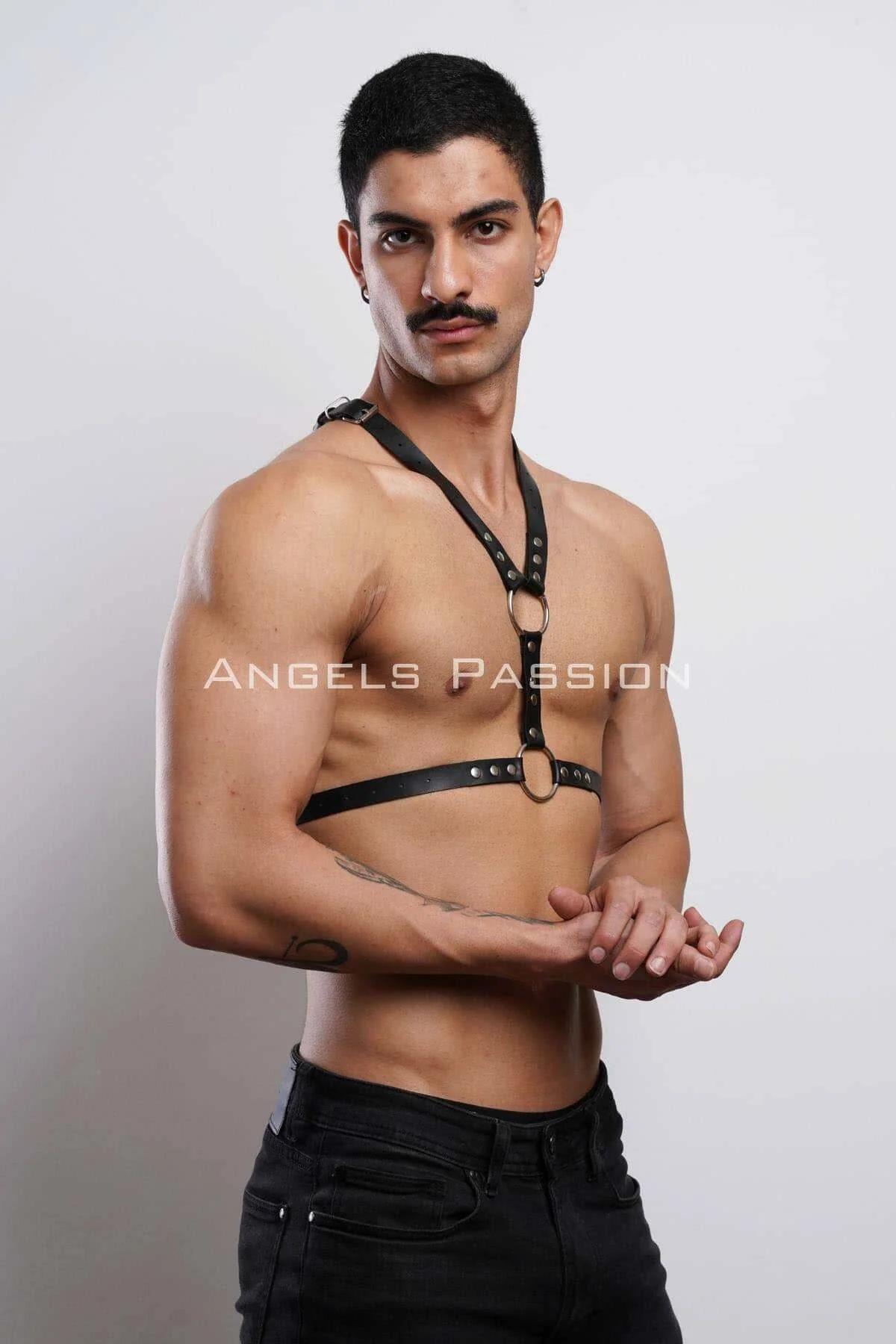 black body harness with Y-strap worn over fitted white tee layered street style