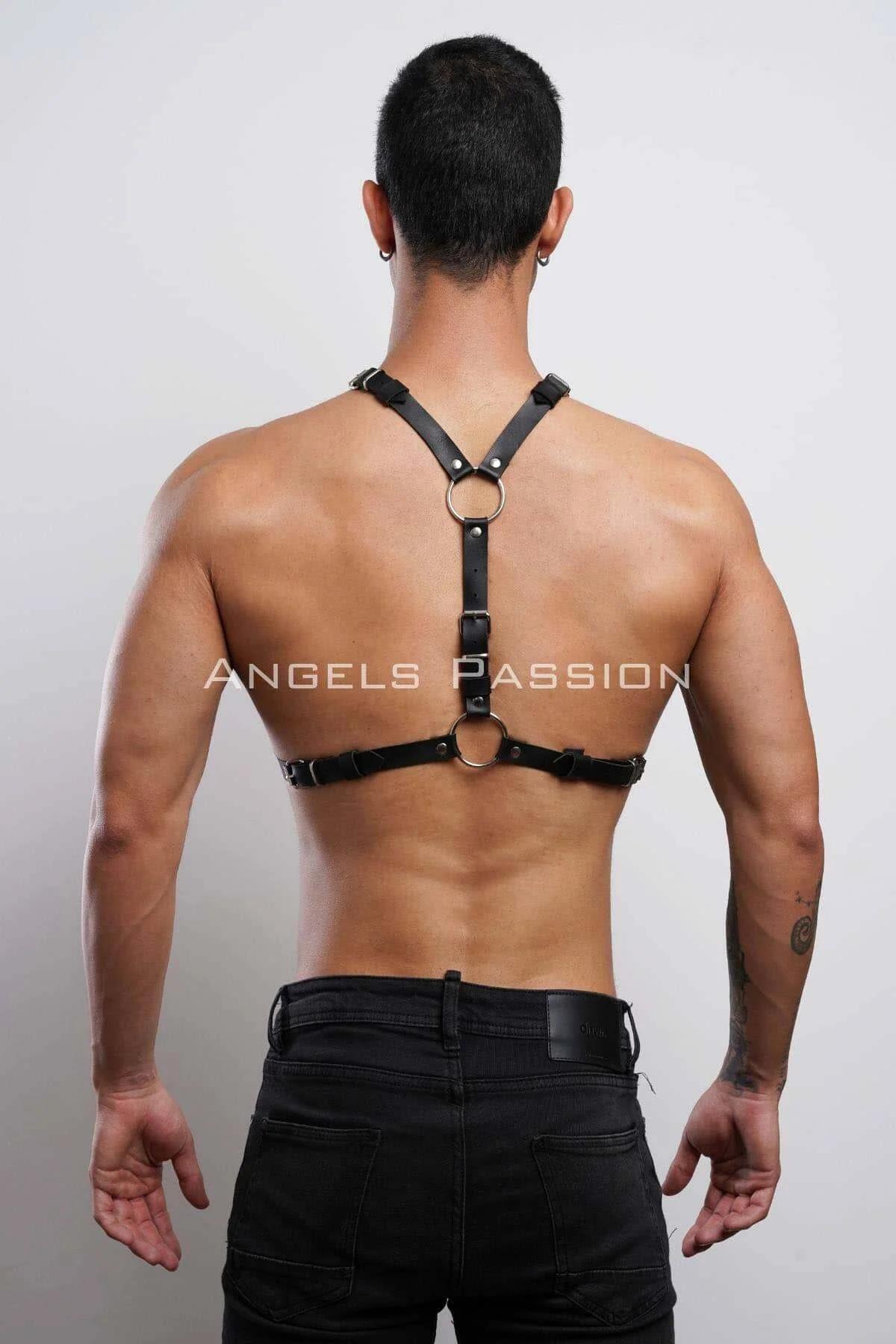 side angle of black faux leather harness showing 1.5 cm strap width and lower chest band placement