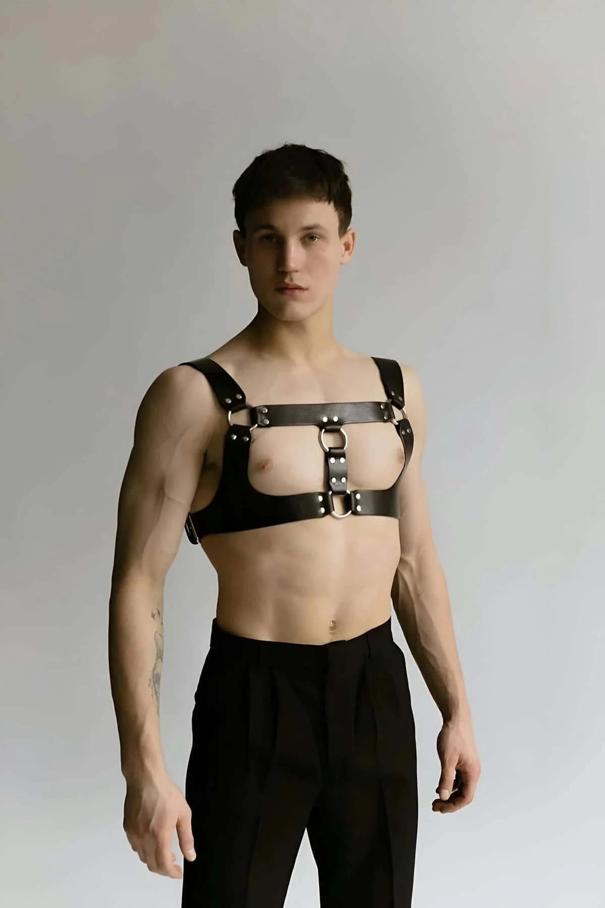 Adjustable black faux leather harness lower torso band with silver pin-buckle closure