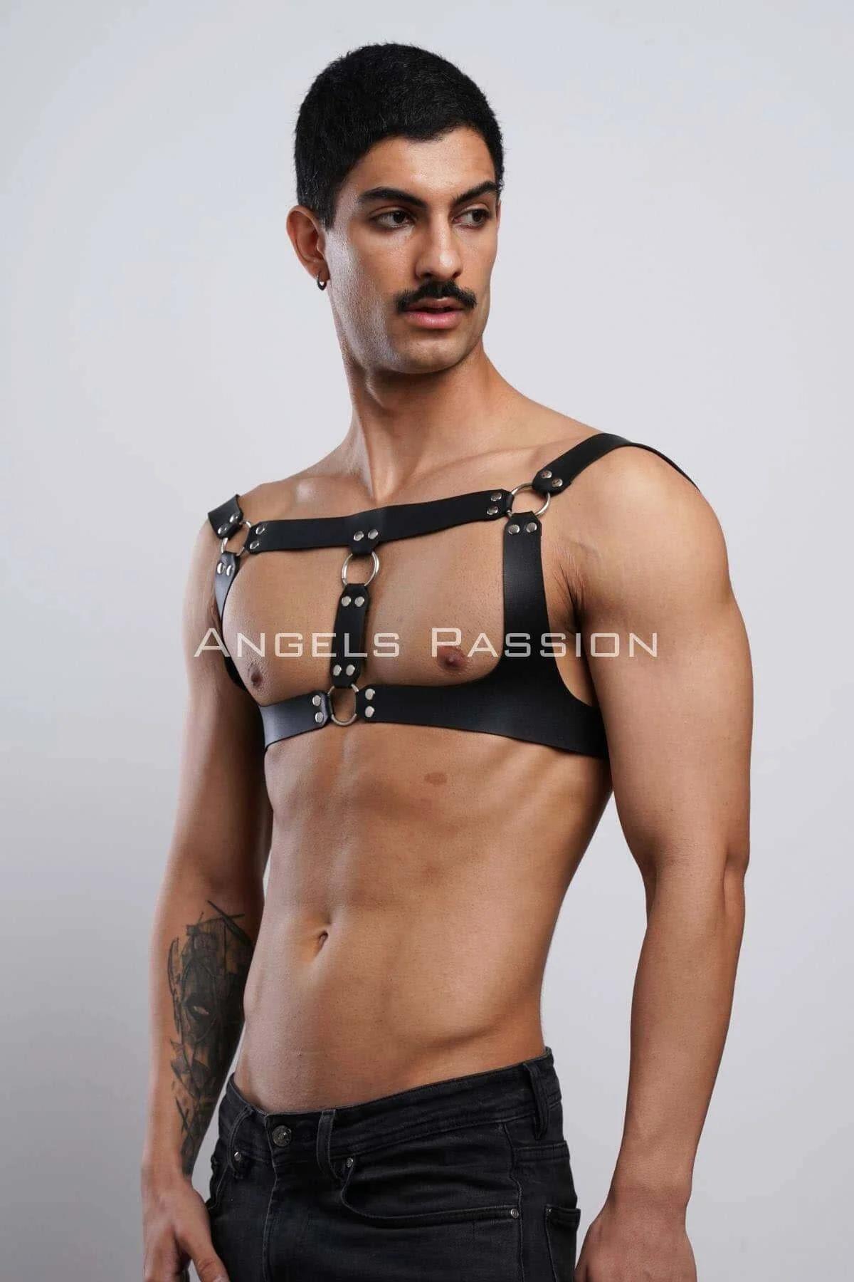 Side angle of black PU leather chest harness showing shoulder strap width and slide-bar buckle detail