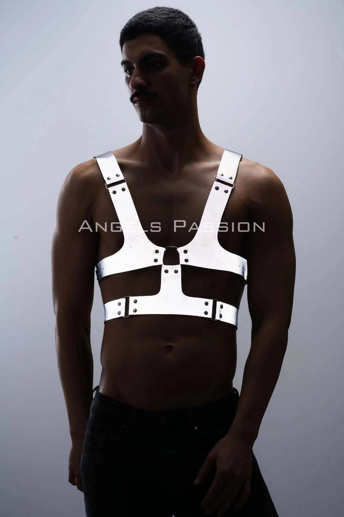 White reflective vegan leather chest harness showing central O-ring and shoulder strap detail