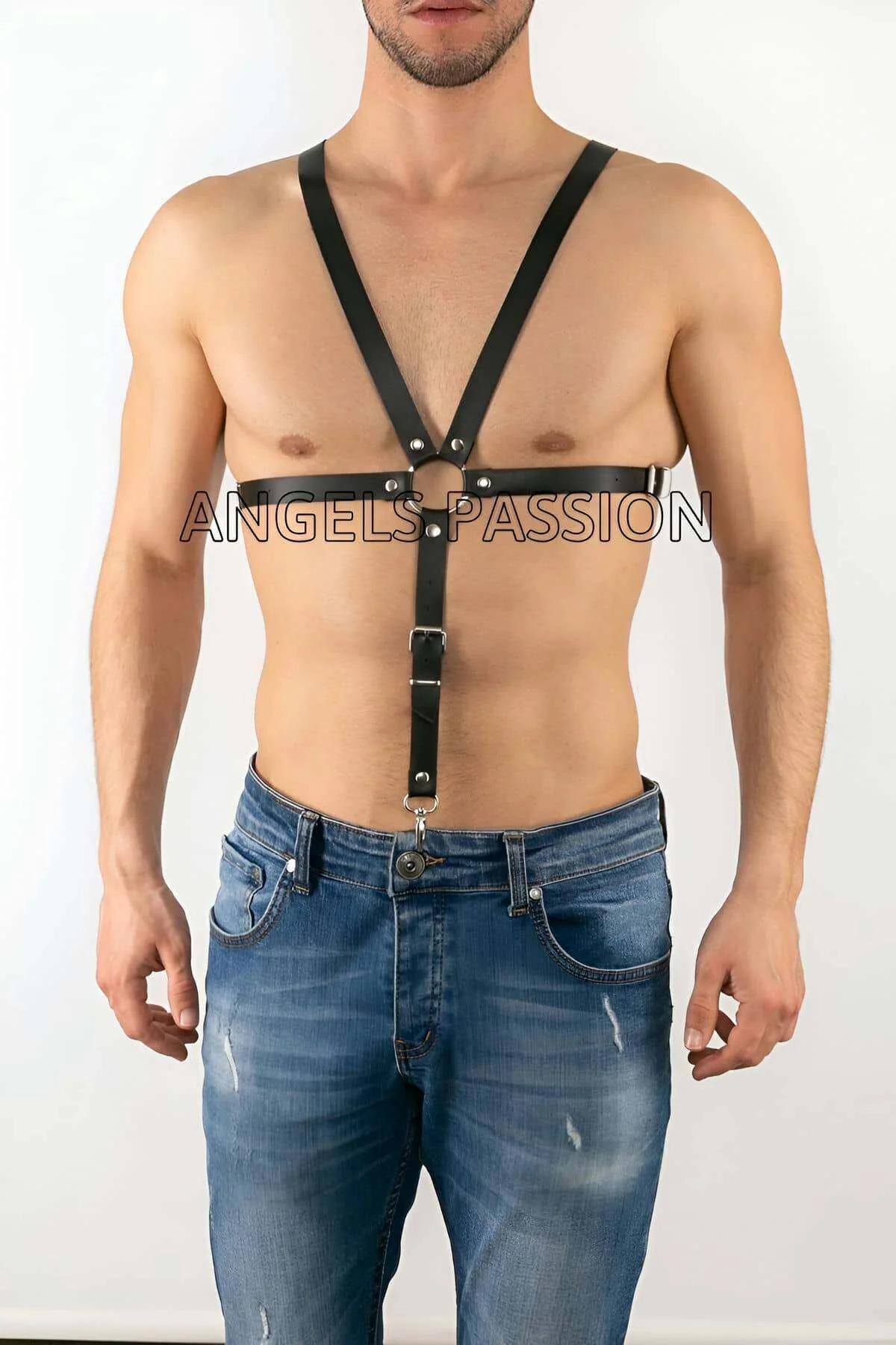 close-up of silver chrome O-ring and tri-glide slider on black faux leather chest harness