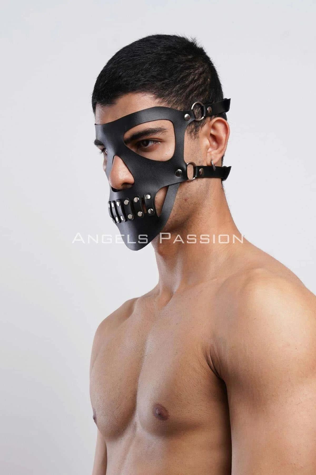 Detail shot of matte black faux leather texture and silver-tone rivet hardware on the skull face mask