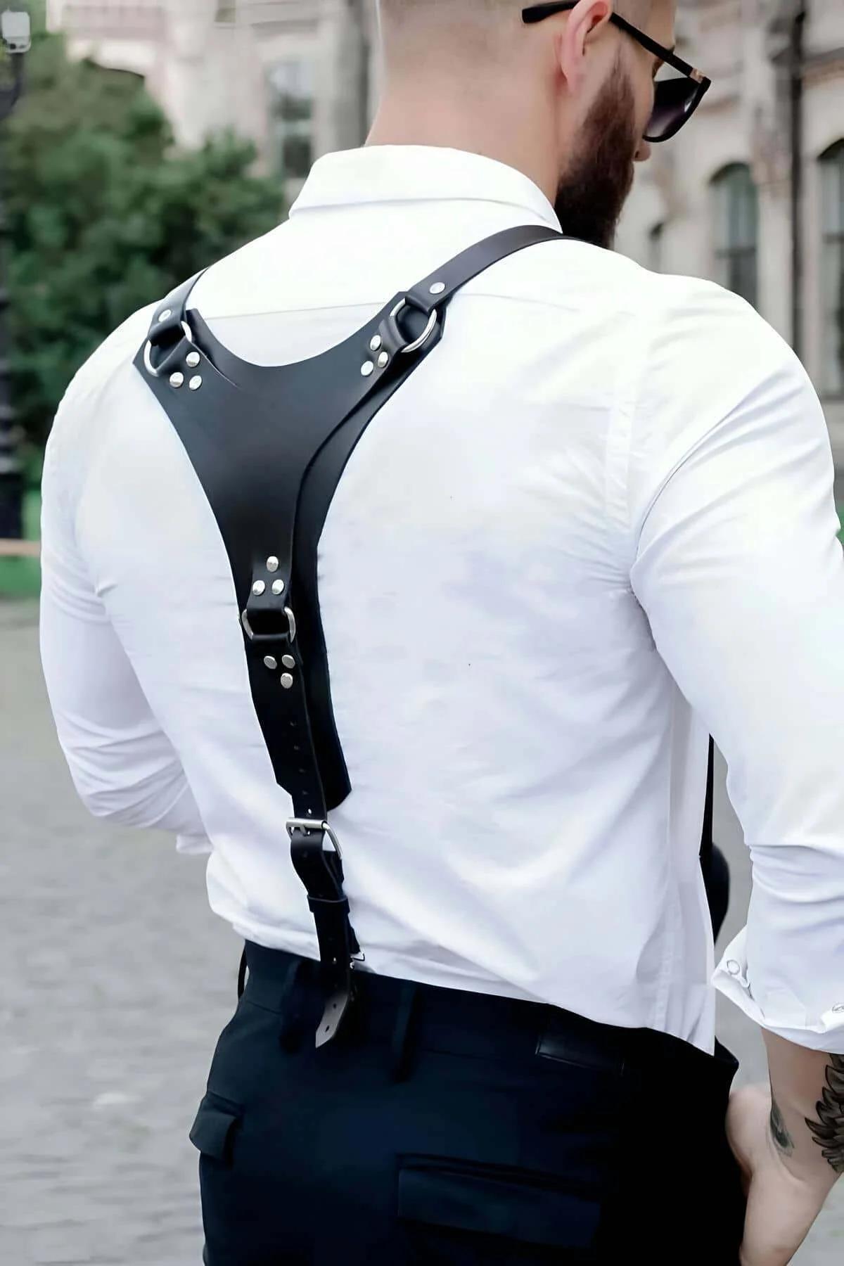 adjustable pin-buckle waist strap on black faux leather men's body harness